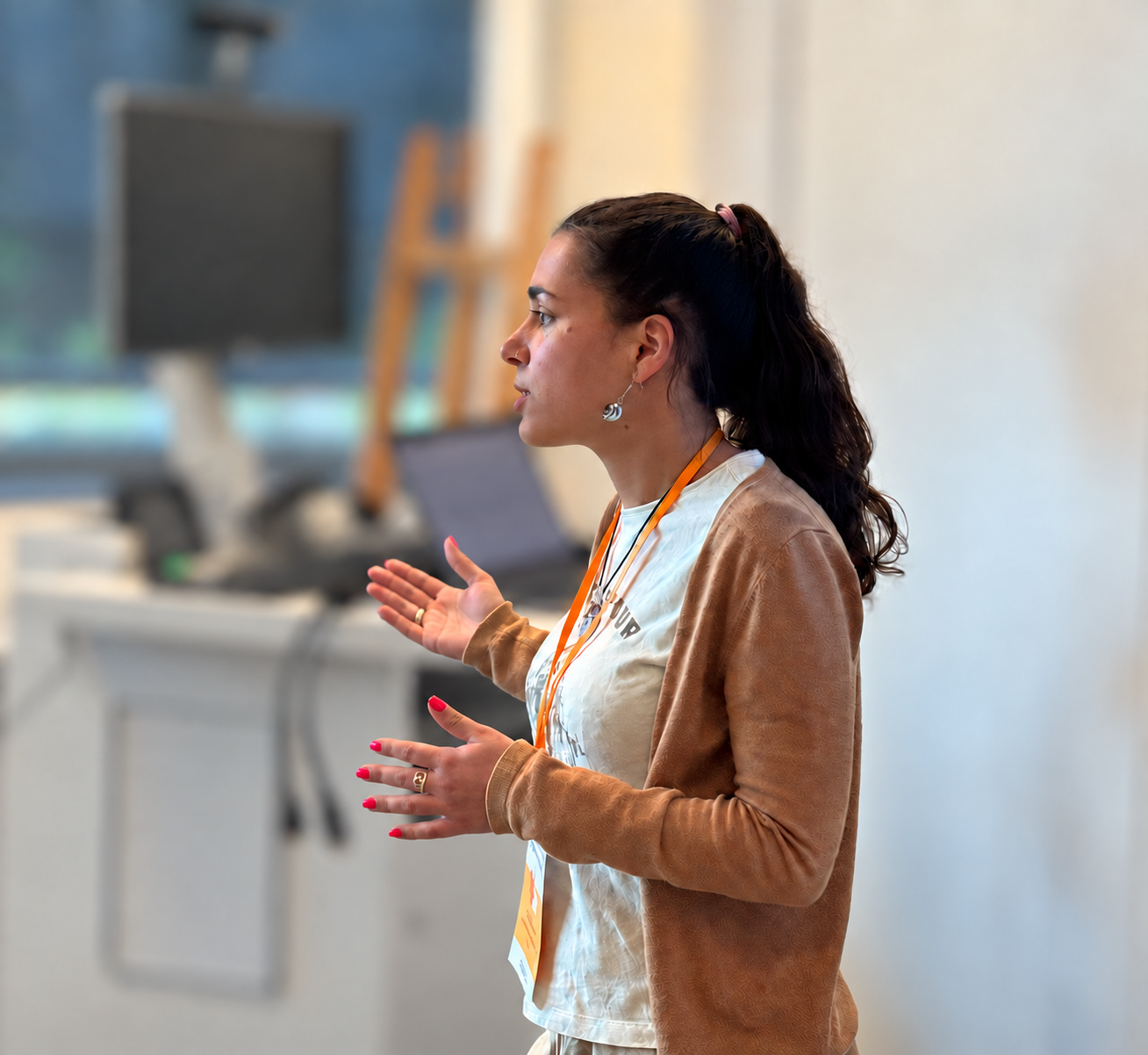 Sabrina speaking at an event